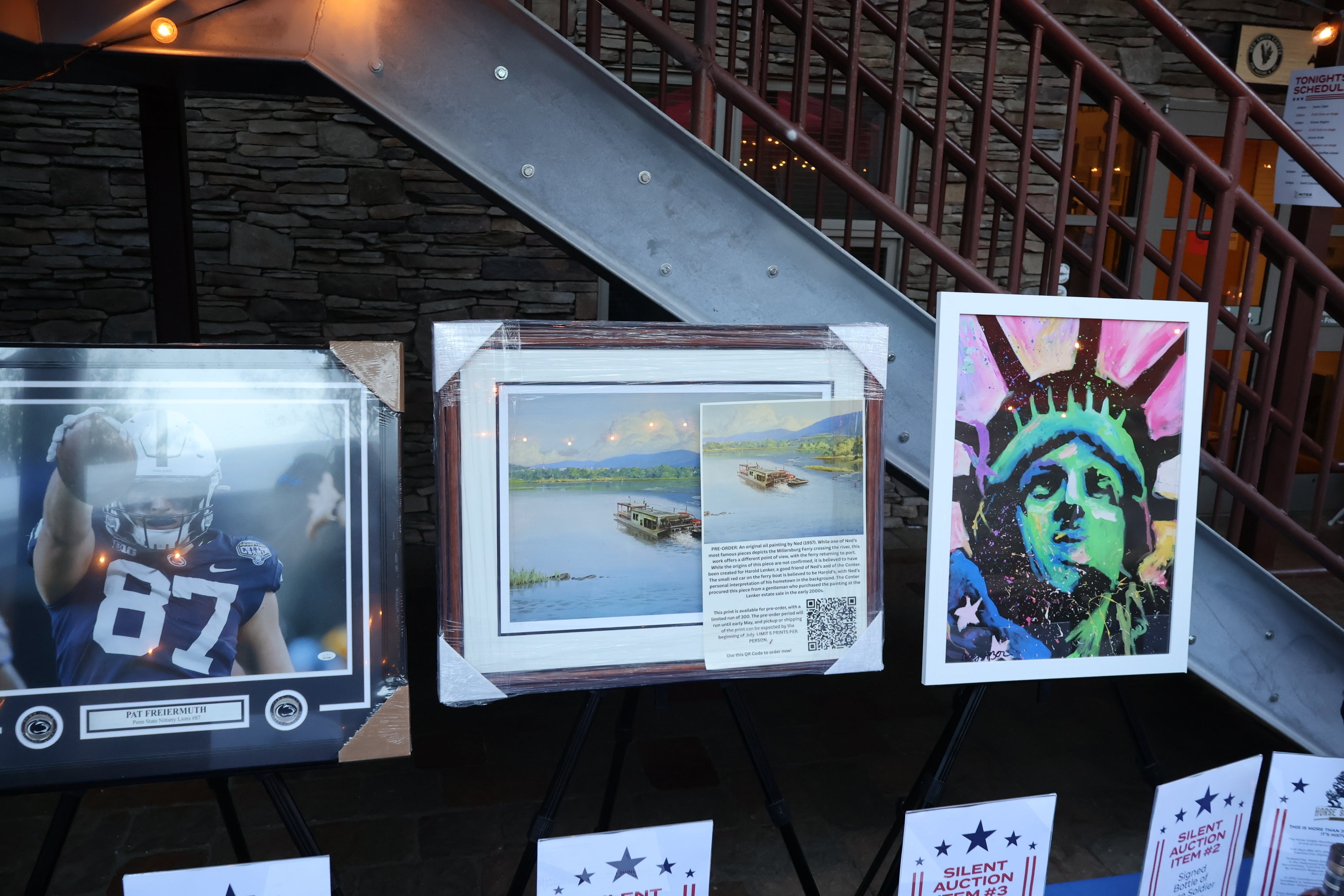 Attendees bid on silent auction items, with proceeds supporting MITER Foundation causes.